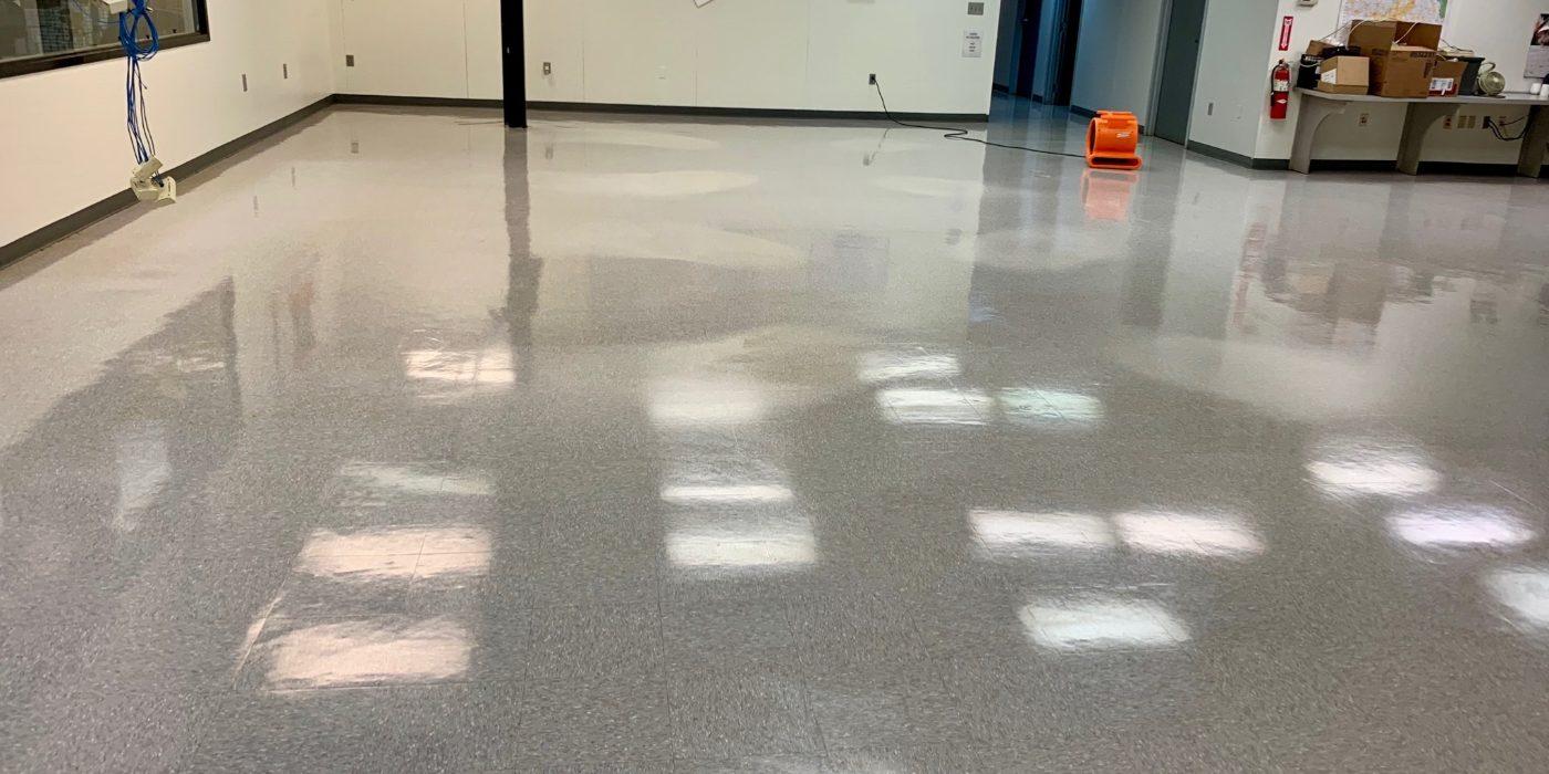 Commercial floor after Dust Away strip, wax, and burnish program